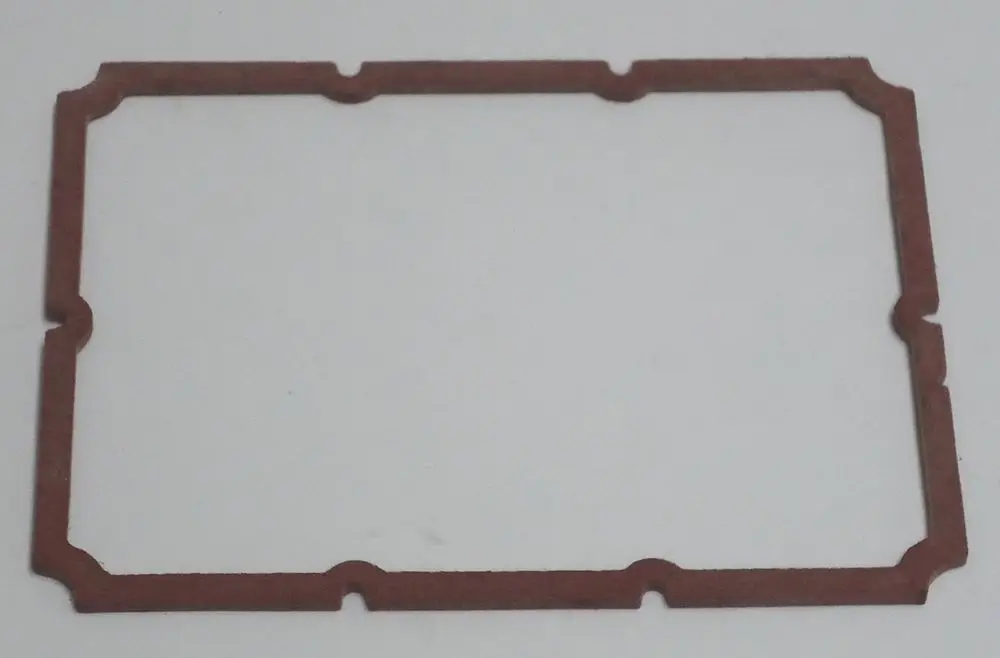 Dichtung aus rotem Material mit rechteckiger Form und hervorstehenden Kanten, geeignet für den Einsatz in Daikin Brennern.
